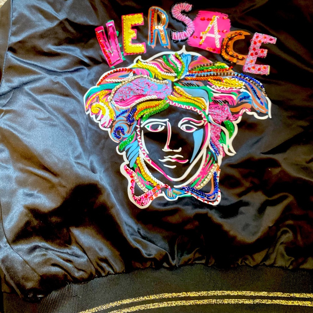 Versace Jacket, kids medium, Black & gold, multi colored back.